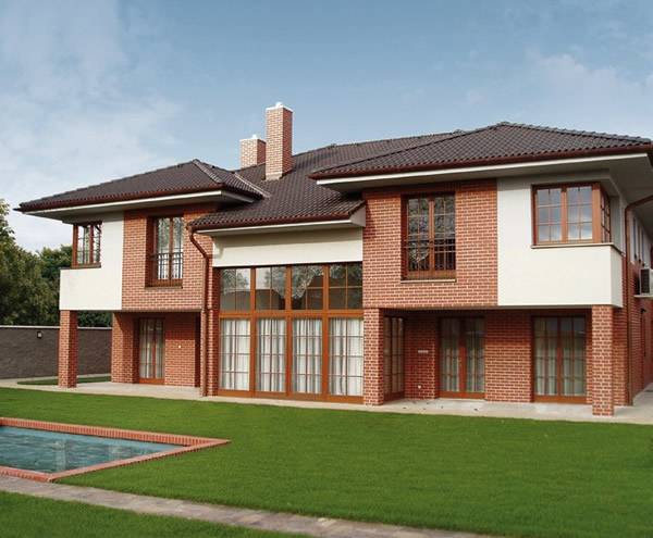 Облицовка деревянного дома клинкерной плиткой: комбинированная отделка фасада