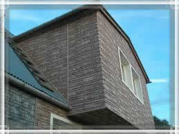 Каменный сайдинг в облицовке домов