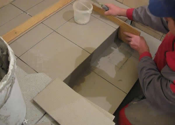 Облицовка ступеней бетонной лестницы керамогранитом