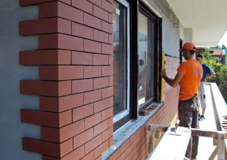 Облицовка зданий плитками под кирпич