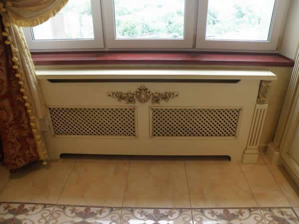 Прекрасный вариант декоративной отделки батарей отопления