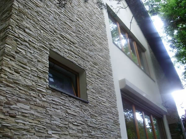 Отделка фронтона камнем