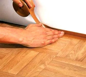 Укладка линолеума