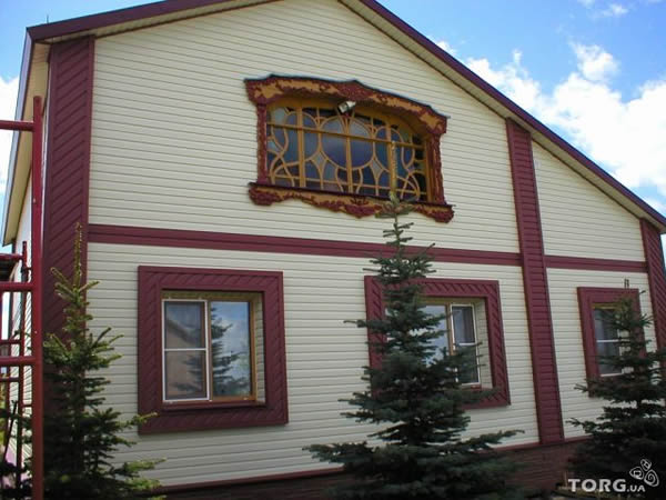 Вариант фасадного дизайна: облицовка сайдингом